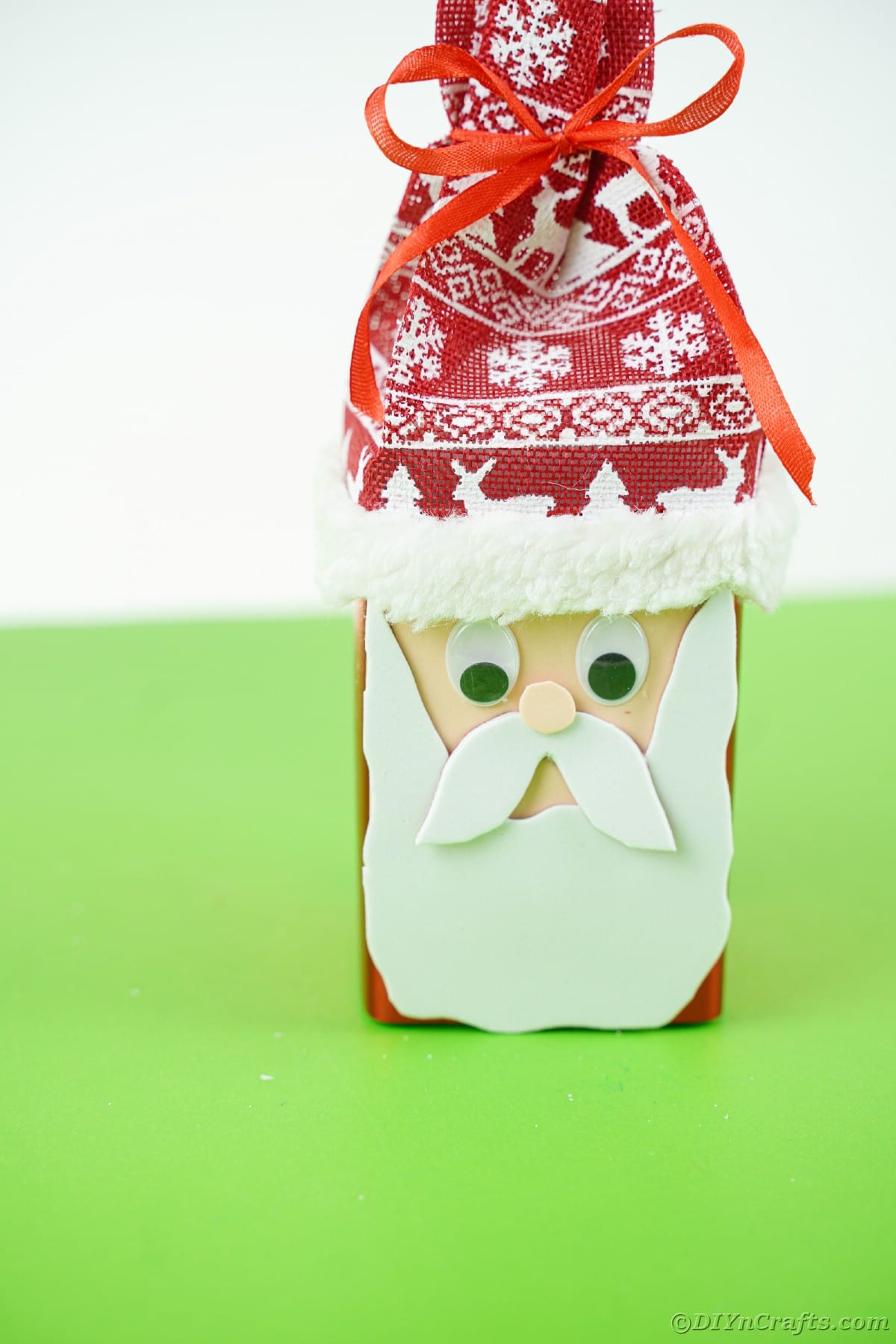 santa claus candy box sitting on green table