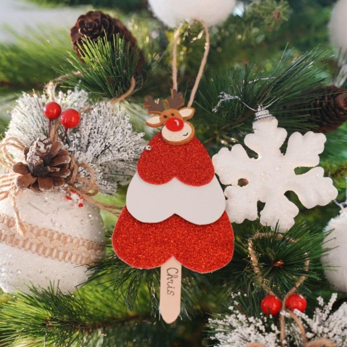 mini tree shaped candy cane ornament on christmas tree