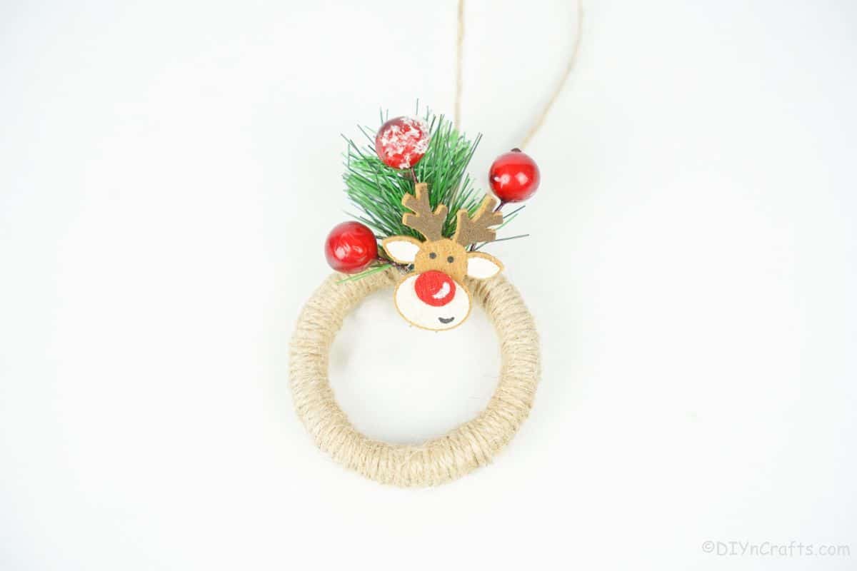 mini wreath ornament on white table