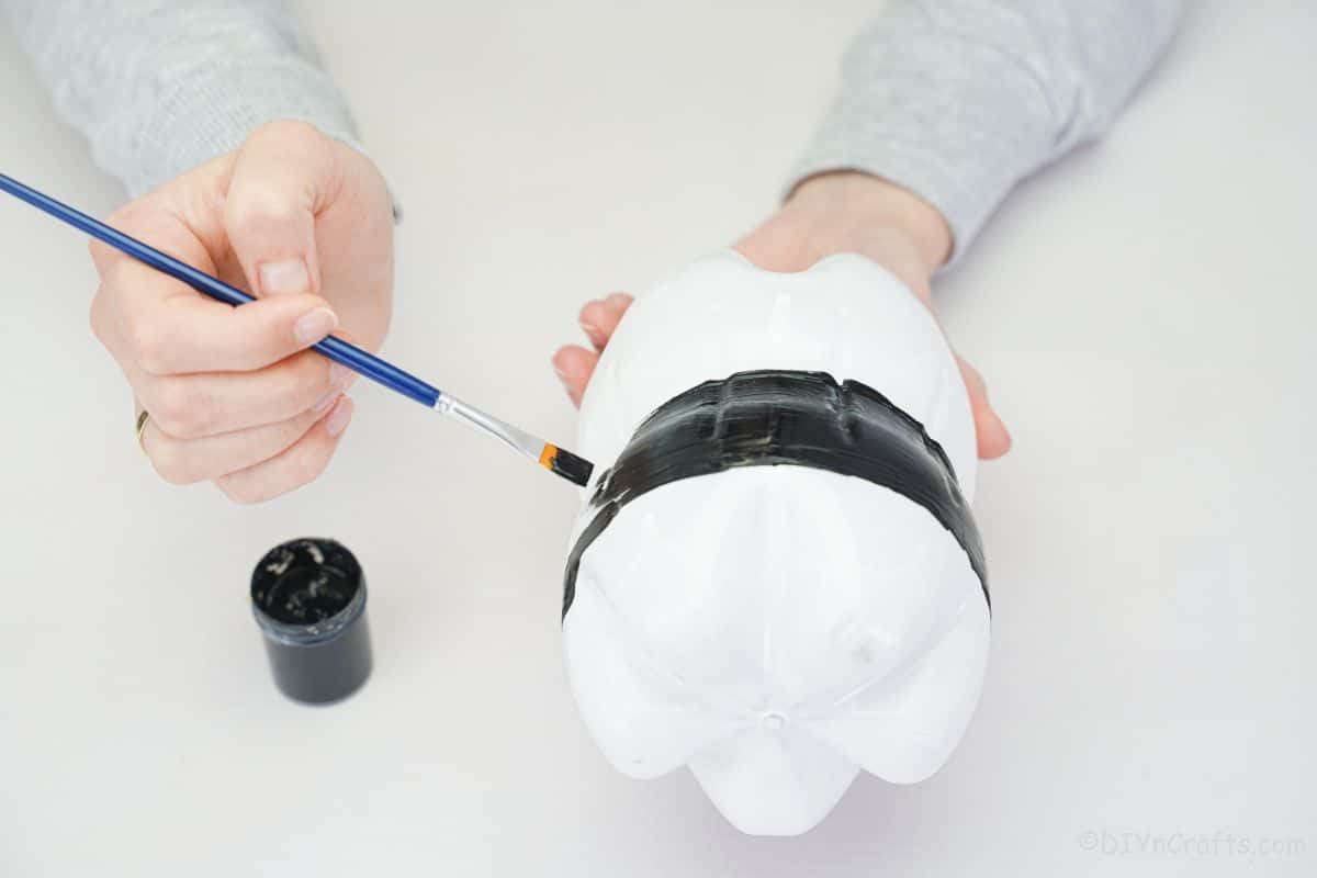 hand drawing and painting on white bottles