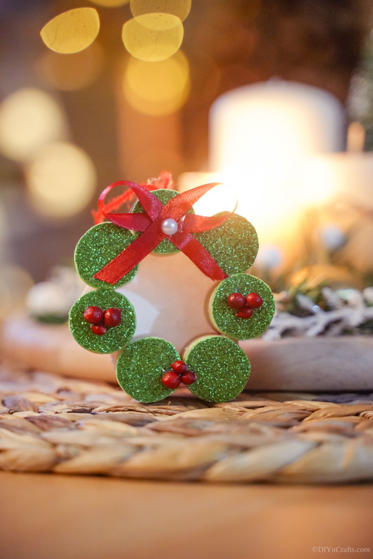 mini cork wreath ornament on bamboo placemat
