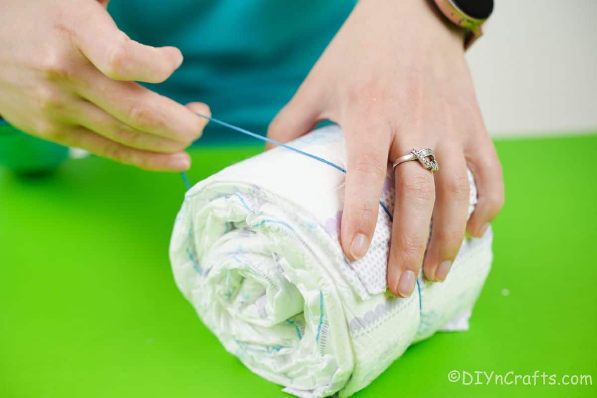 securing diapers with rubber band