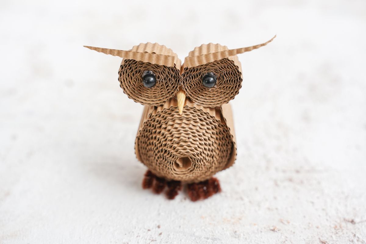 paper owl against white background