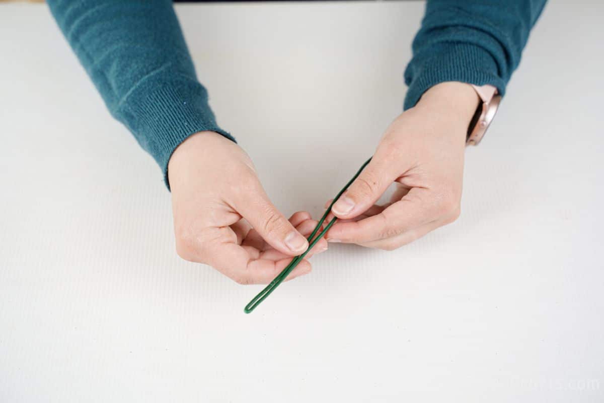 hand folding floral wire in half