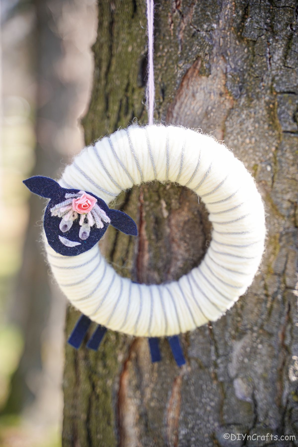 sheep wreath hanging on tree