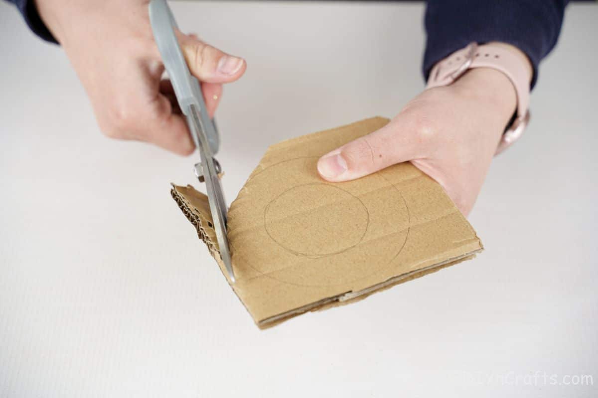 scissors cutting cardboard