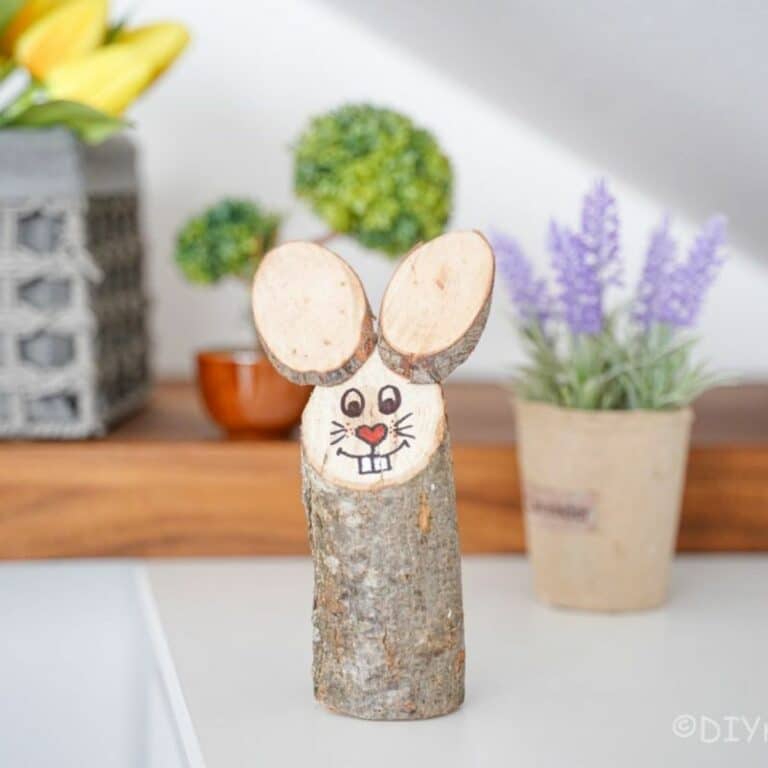 log with bunny face on white counter