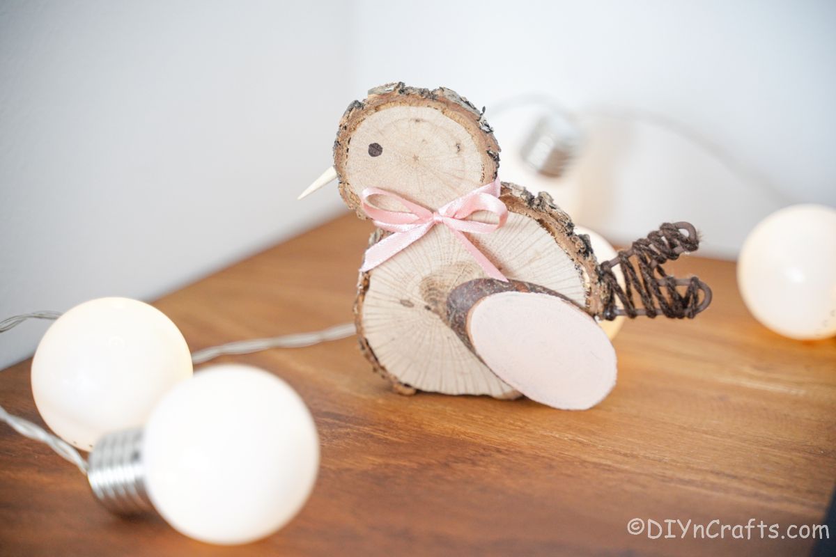 wood slice chick on wood table with lights