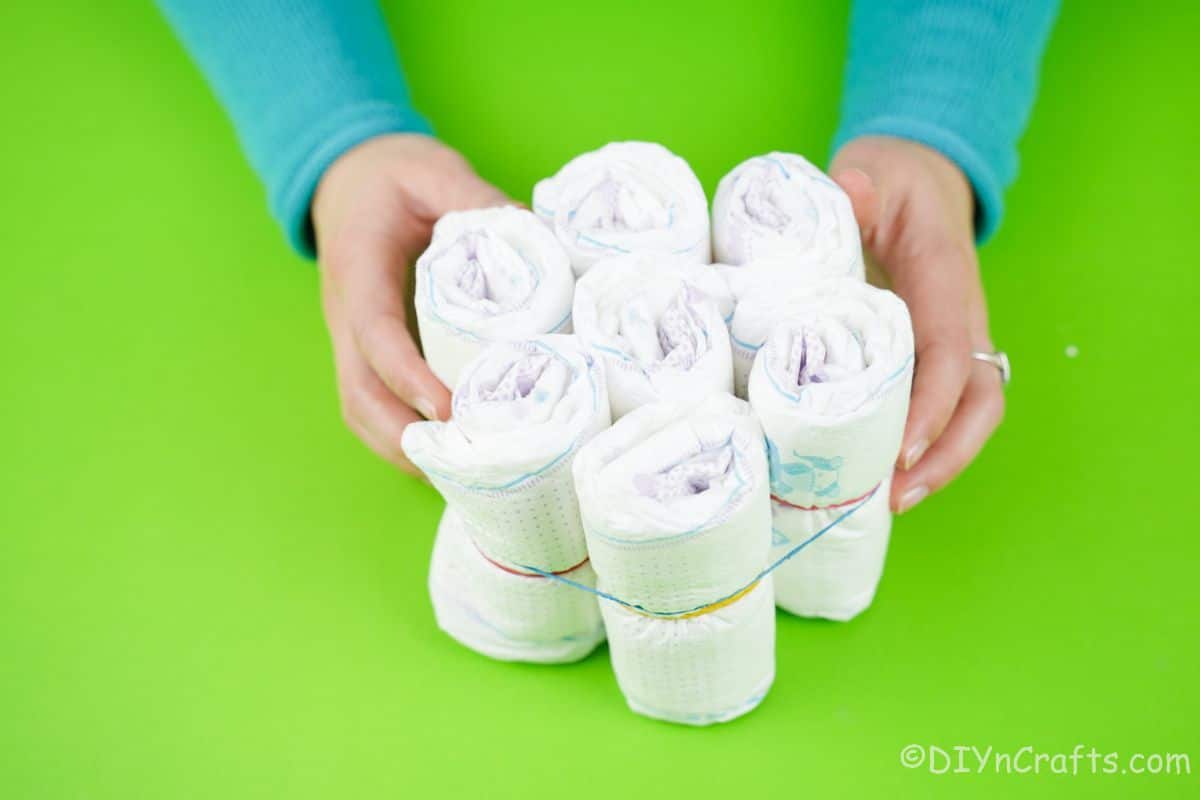 rubber band around bundle of 7 diapers