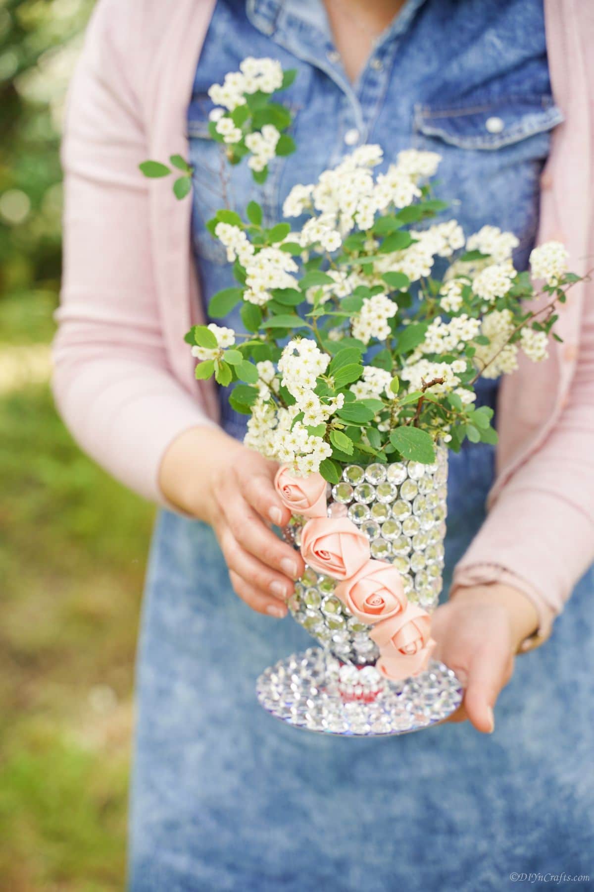 white flowers in sparkling rhinestone vase