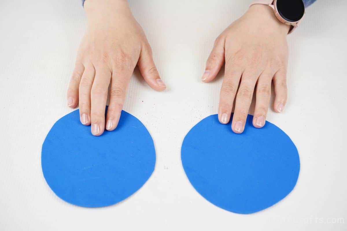 two foam paper circles on white table