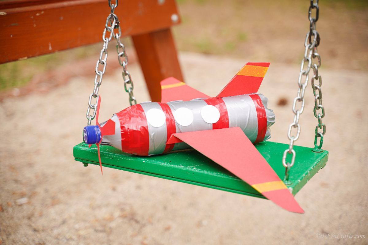 toy airplane on swingset