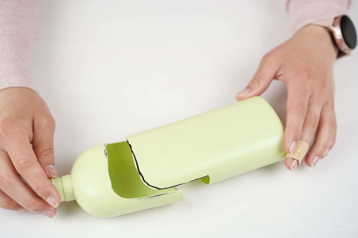 shampoo bottle being cut