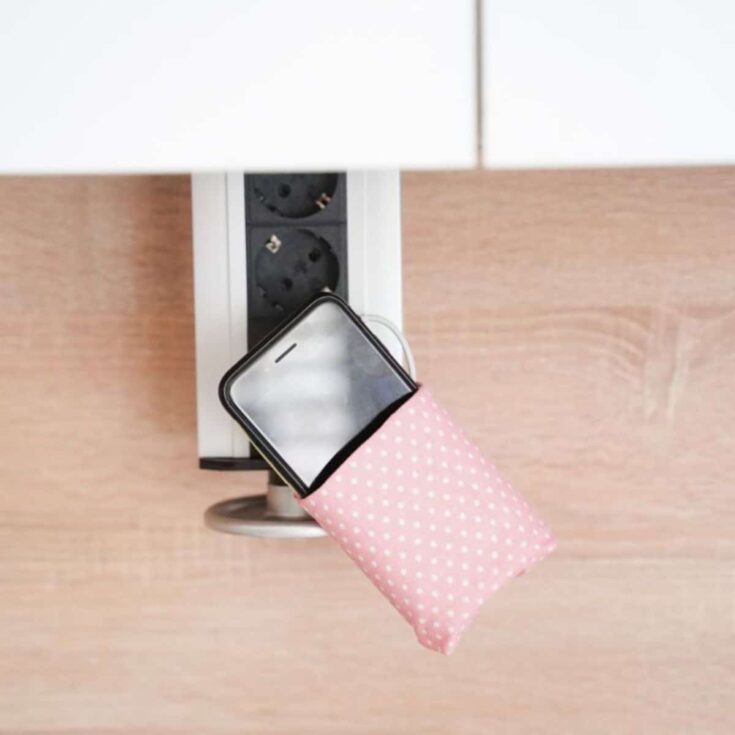 cellphone in pink white polka dot fabric holder