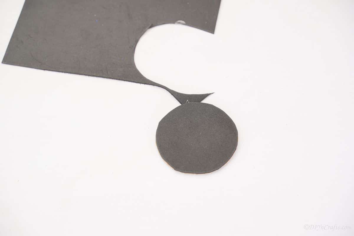 black circle cut out of paper