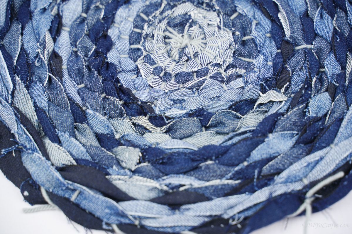 close up image of old blue jean placemat