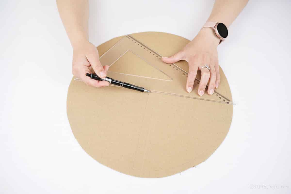 marking cardboard circle using ruler