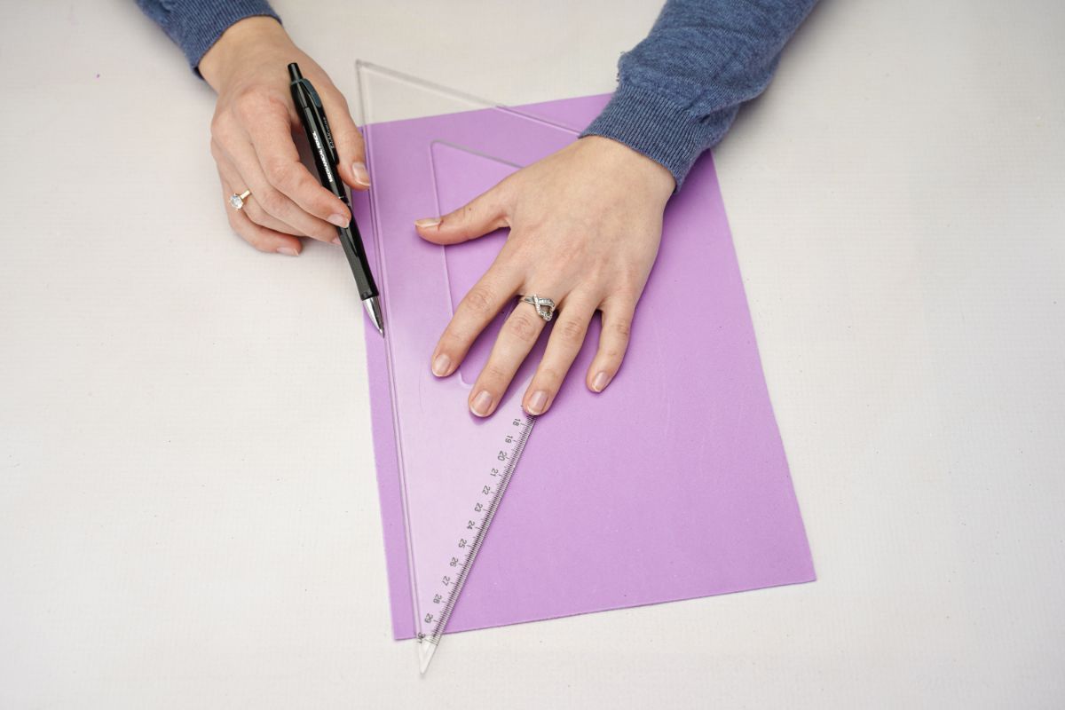 measuring purple glitter paper