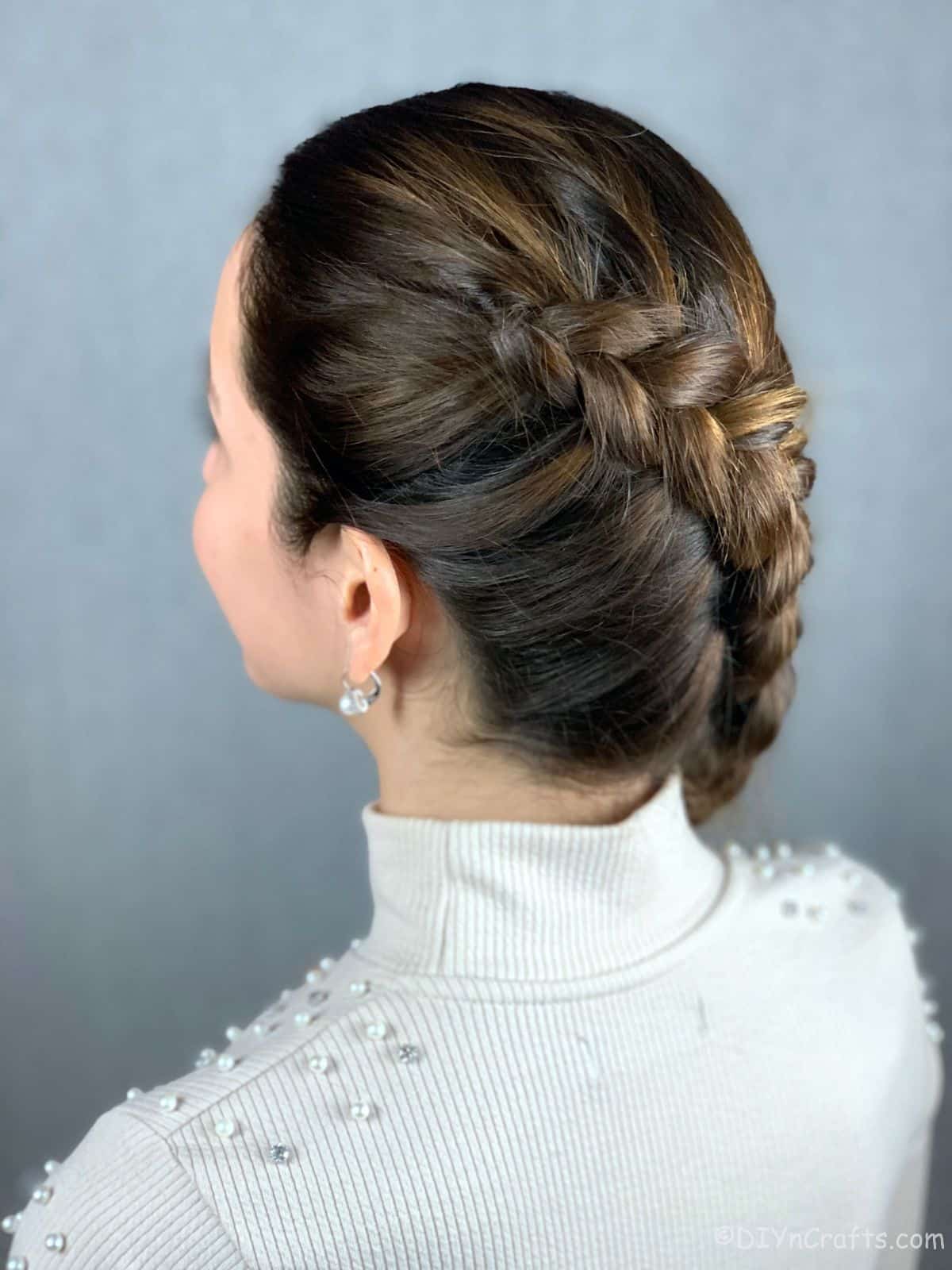 side of braid on woman with brown hair