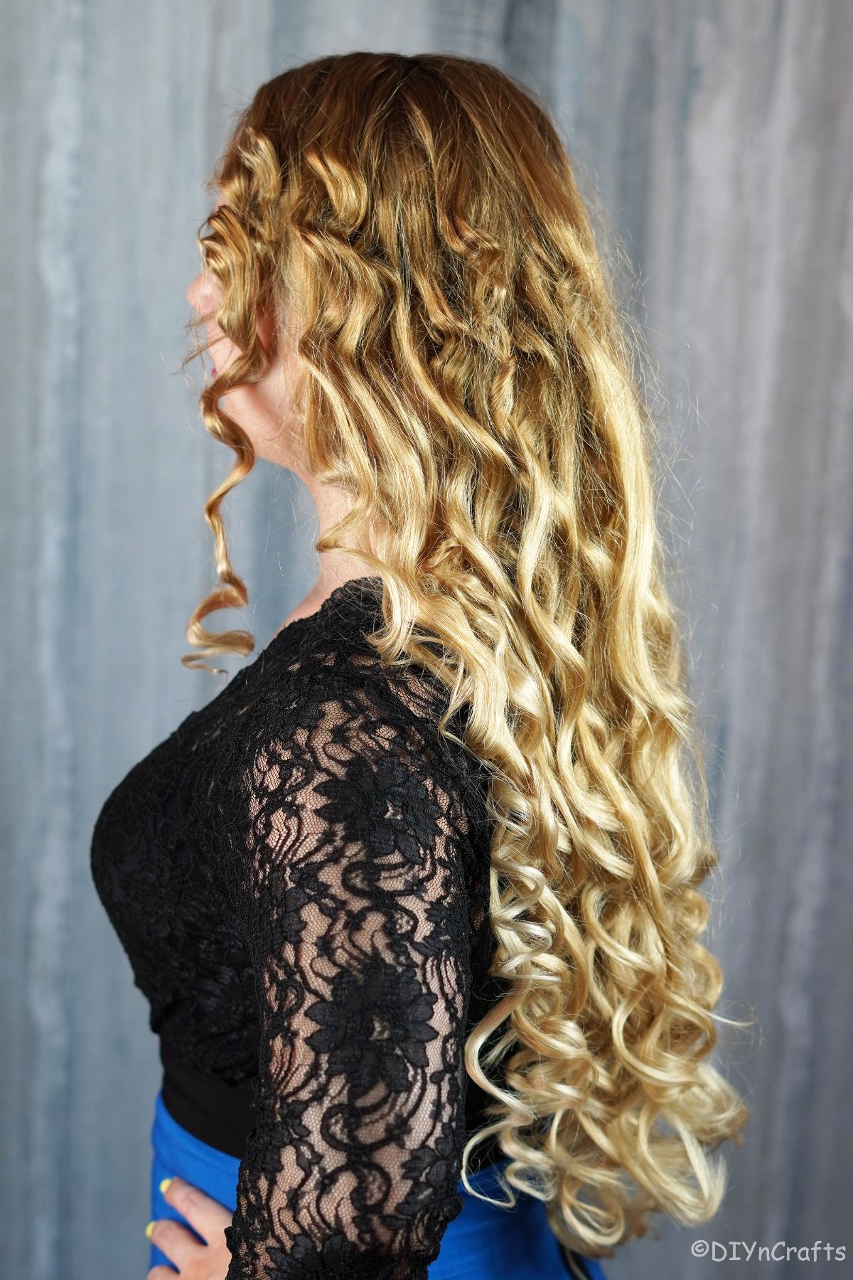 curly blonde hair hanging down back