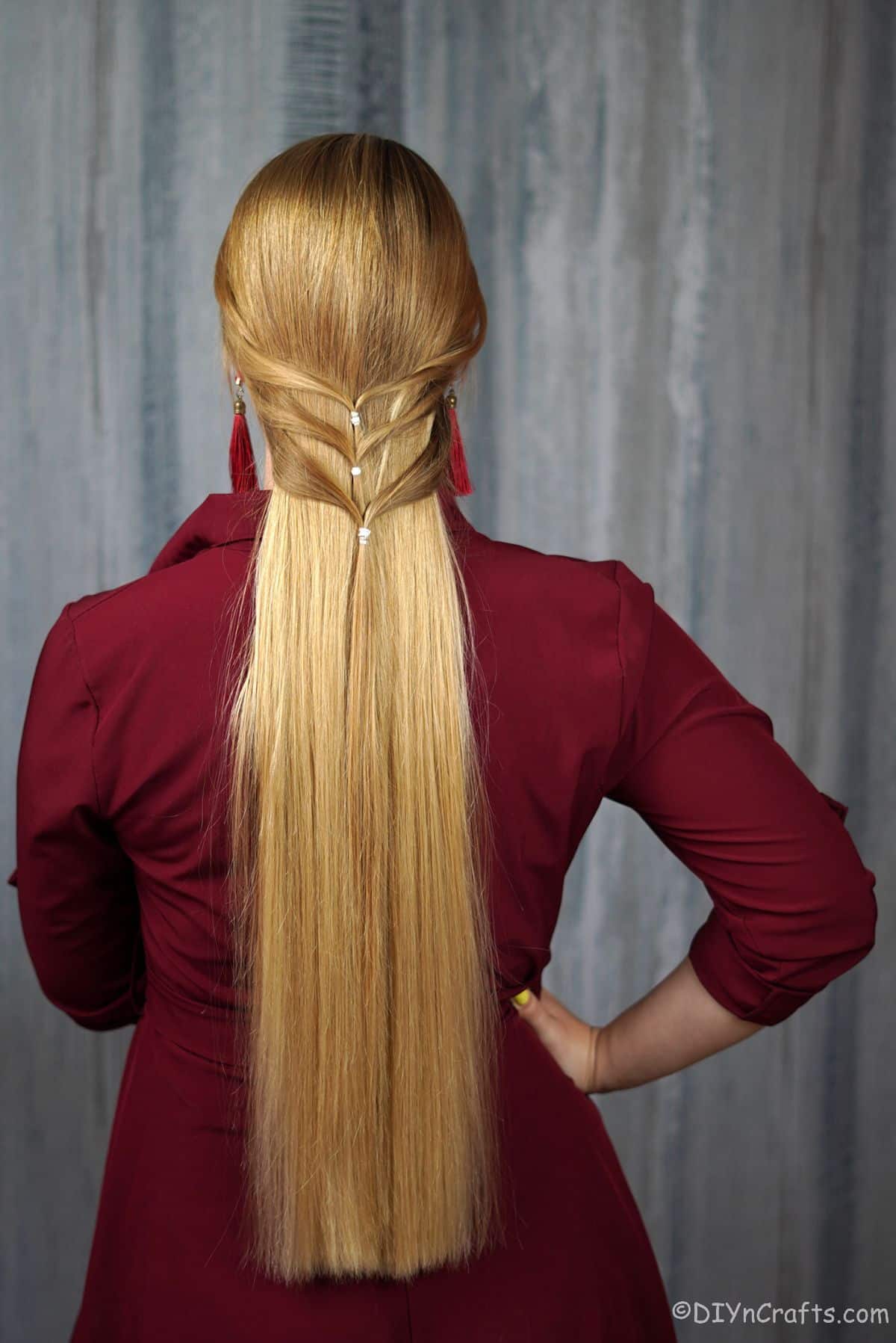 three layered low ponytail on blonde woman
