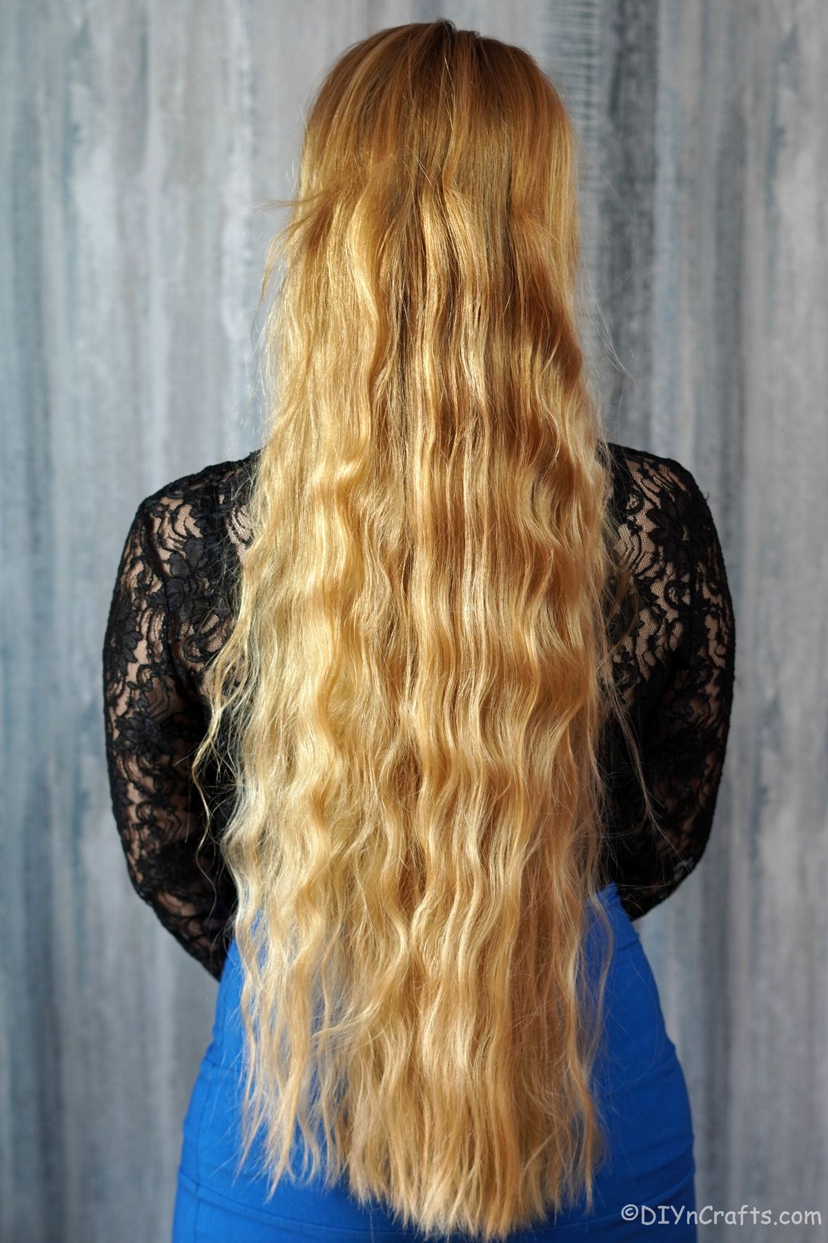 back of blondes head showing long hair with beach waves