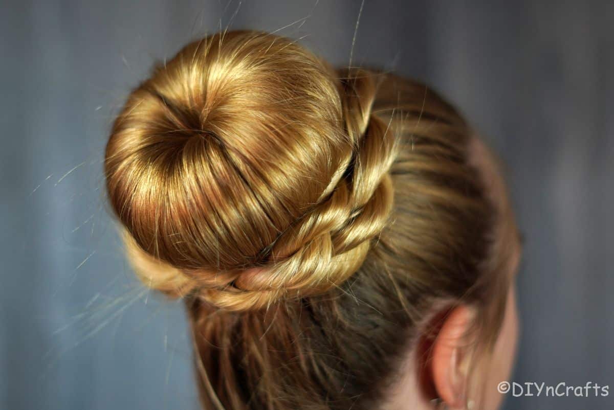 hair donut bun with twist braids around the base