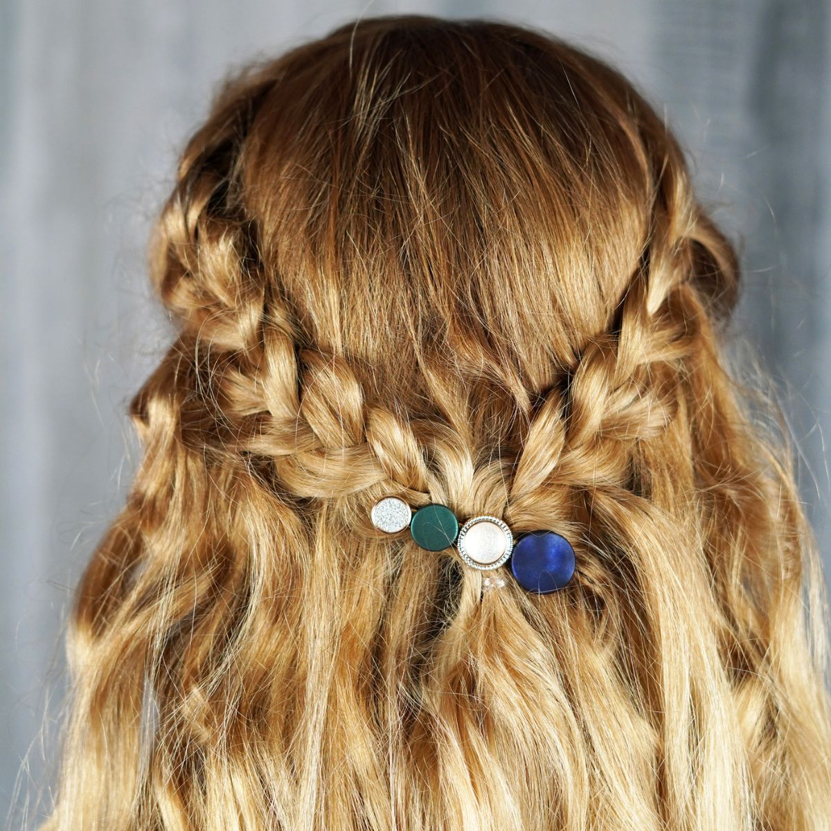 Image of Half up, half down hairstyle with a barrette for 7th graders
