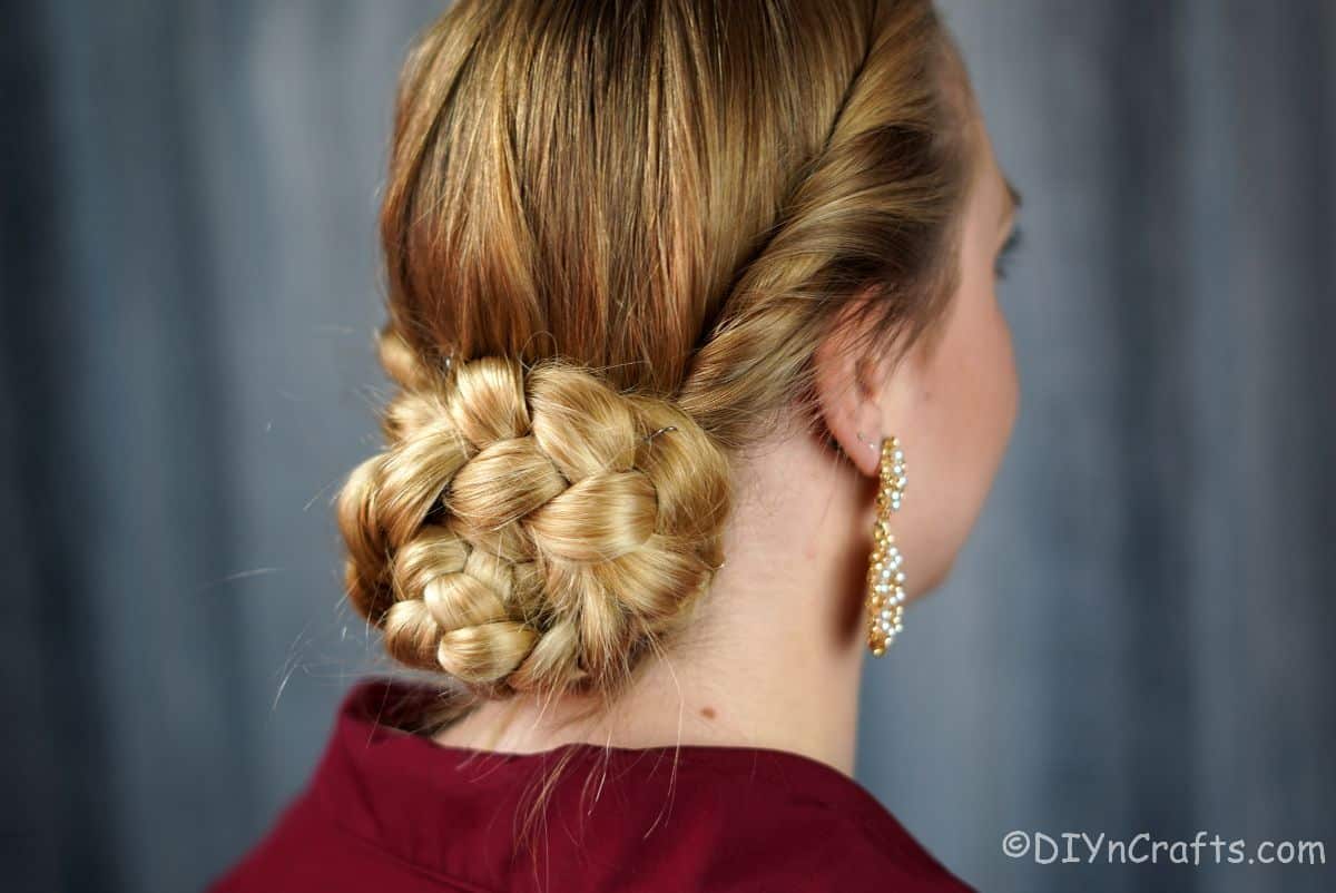 braided back of low bun with twisted sides