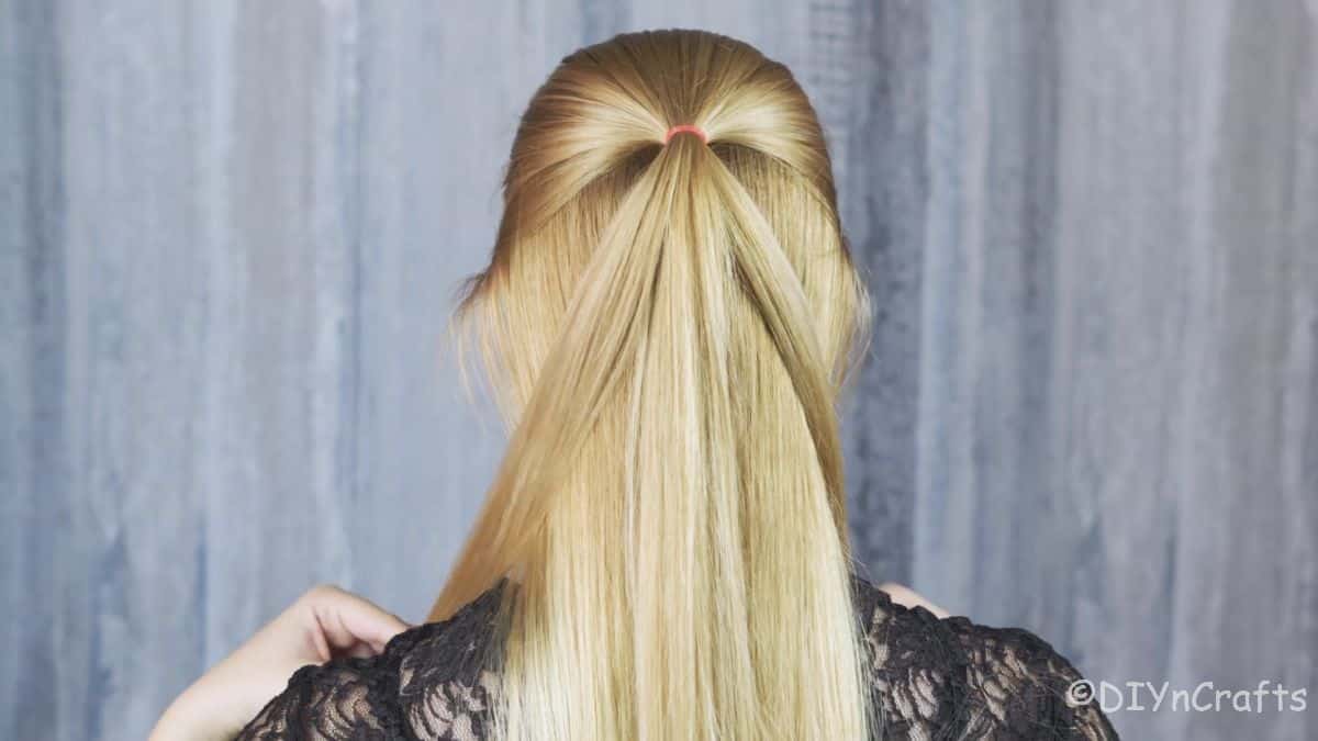 half up ponytail in place