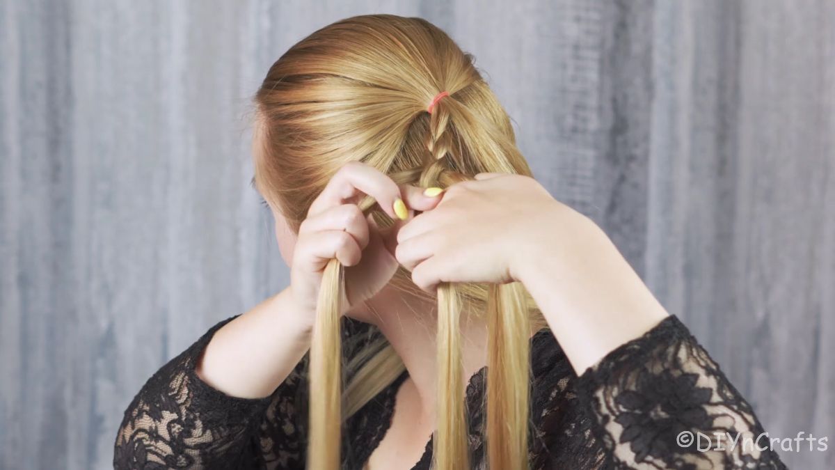 hair being braided on back of head