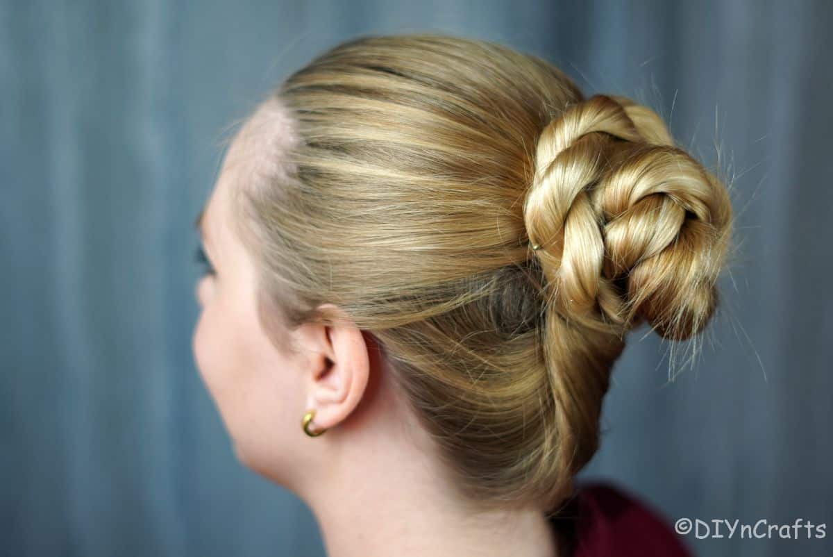 side or rope twist bun in blonde hair