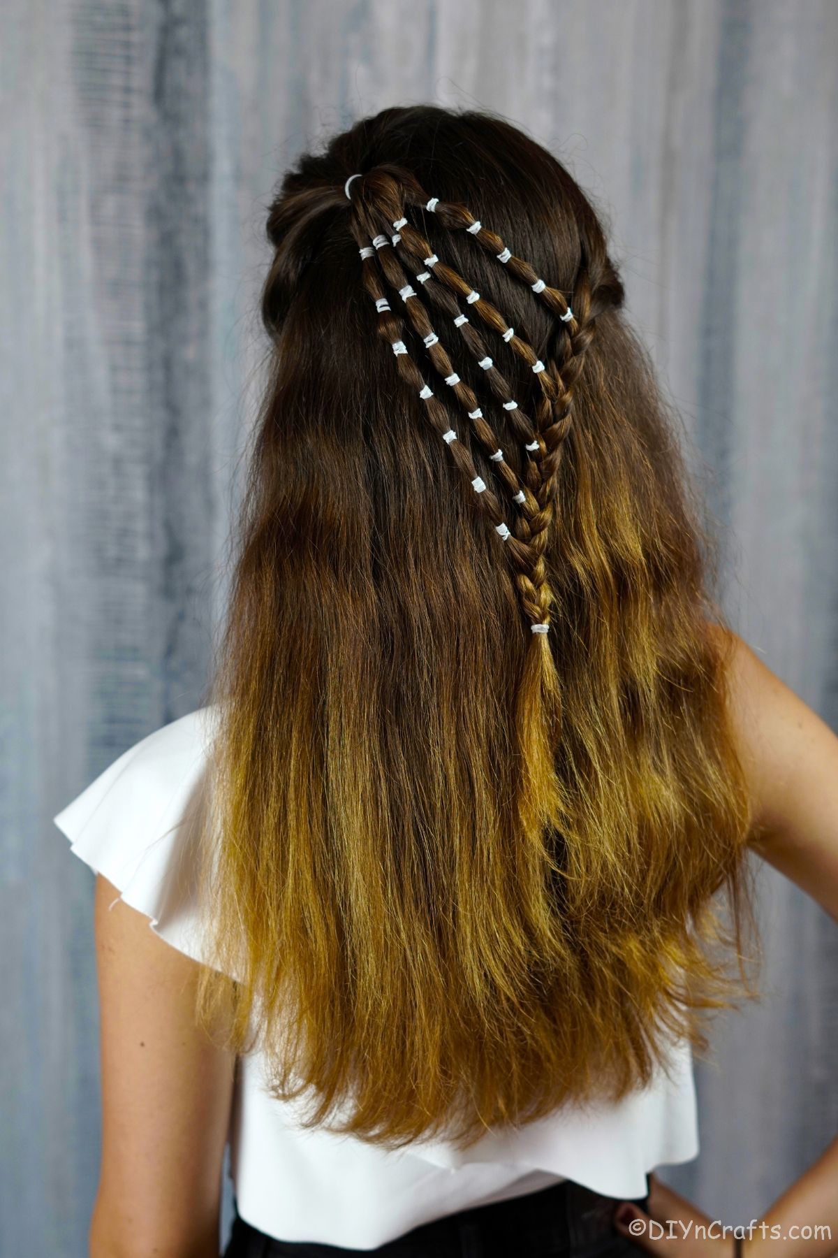 waterfall bubble braids with white accents on brown hair