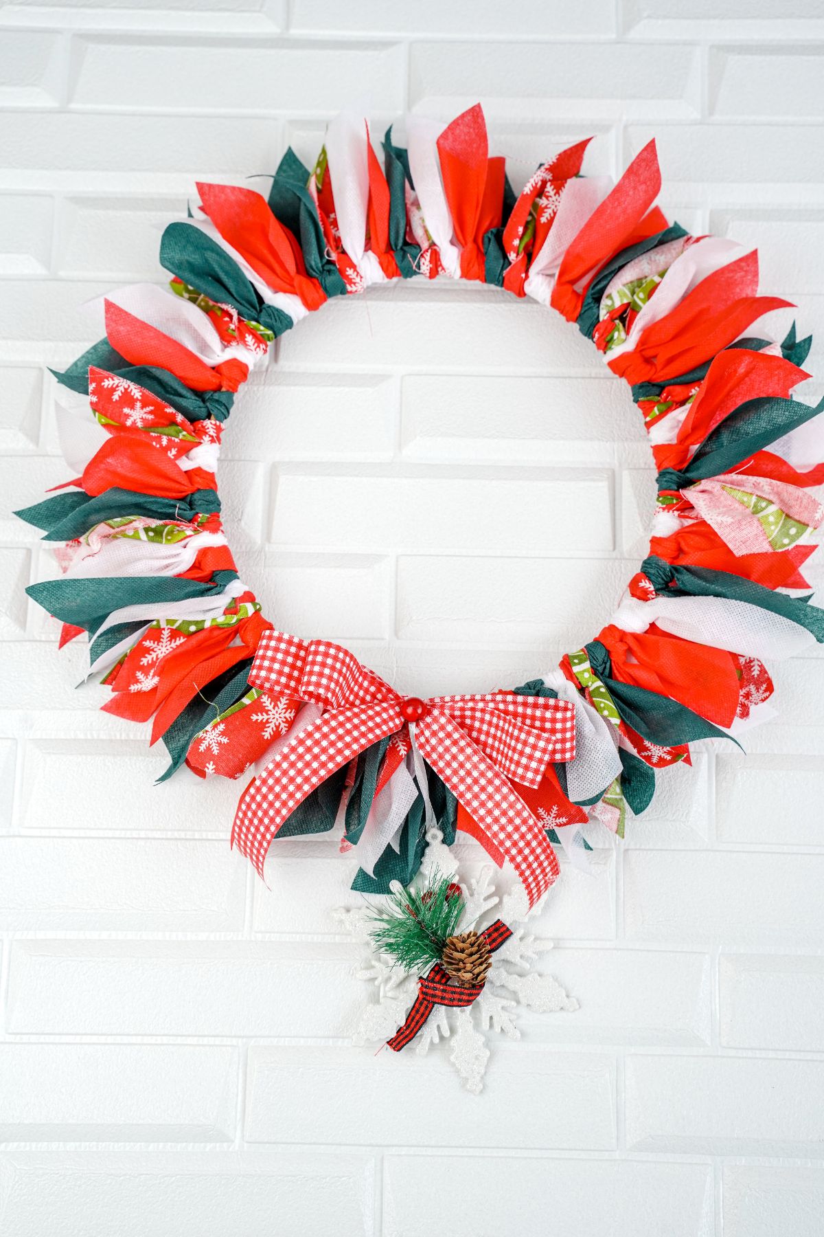 white background behind Christmas rag wreath