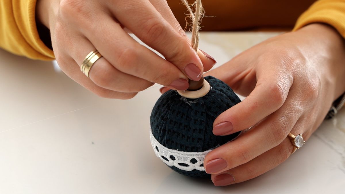 gluing bead on top of ornament