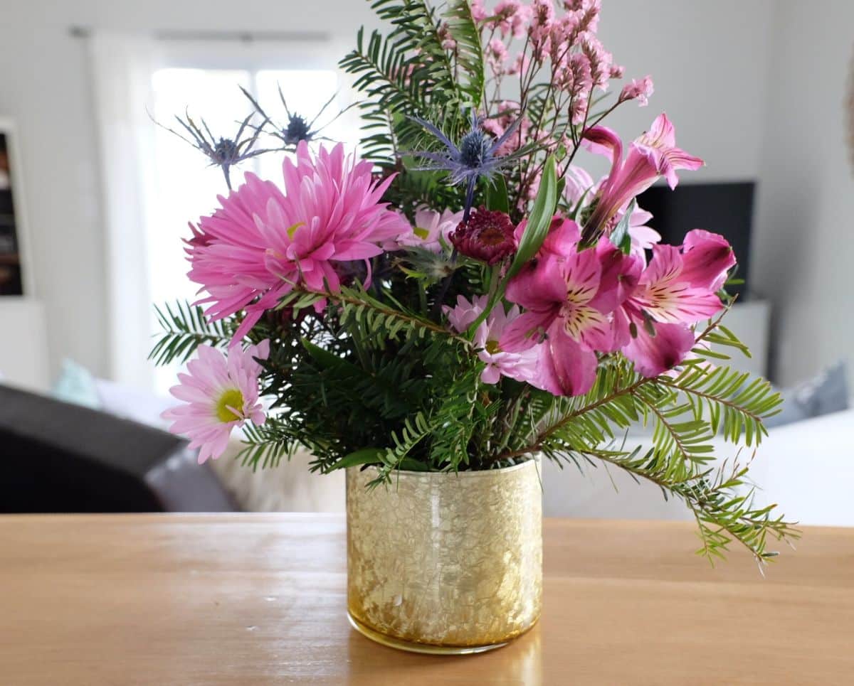 Recycled Candle Jar Flower Arrangement