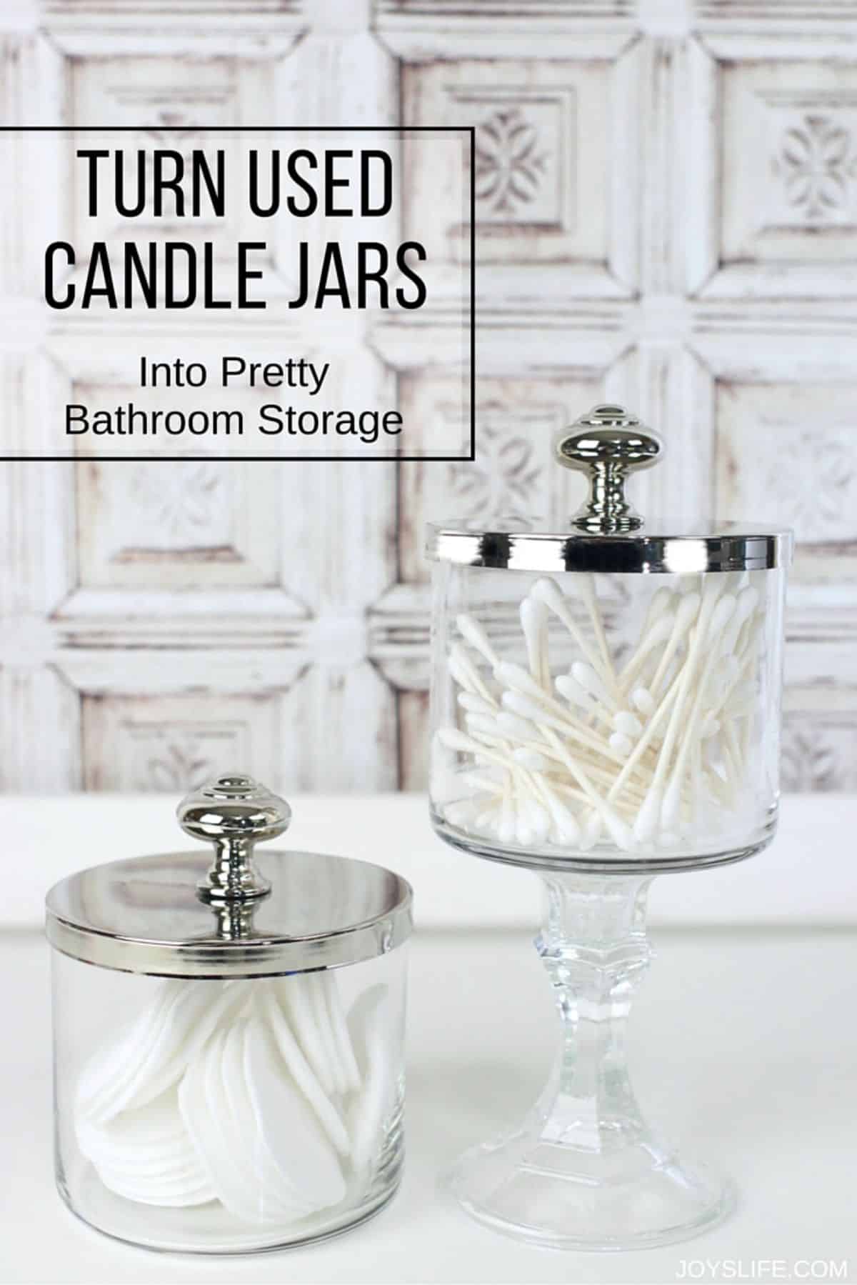 Two candle jars uses as bathroom storage.
