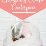 simple holiday centerpiece with text which reads easy diy christmas cloche centerpiece