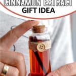 holding a bottle of homemade cinnamon extract gift idea with text which reads easy diy homemade cinnamon extract gift idea