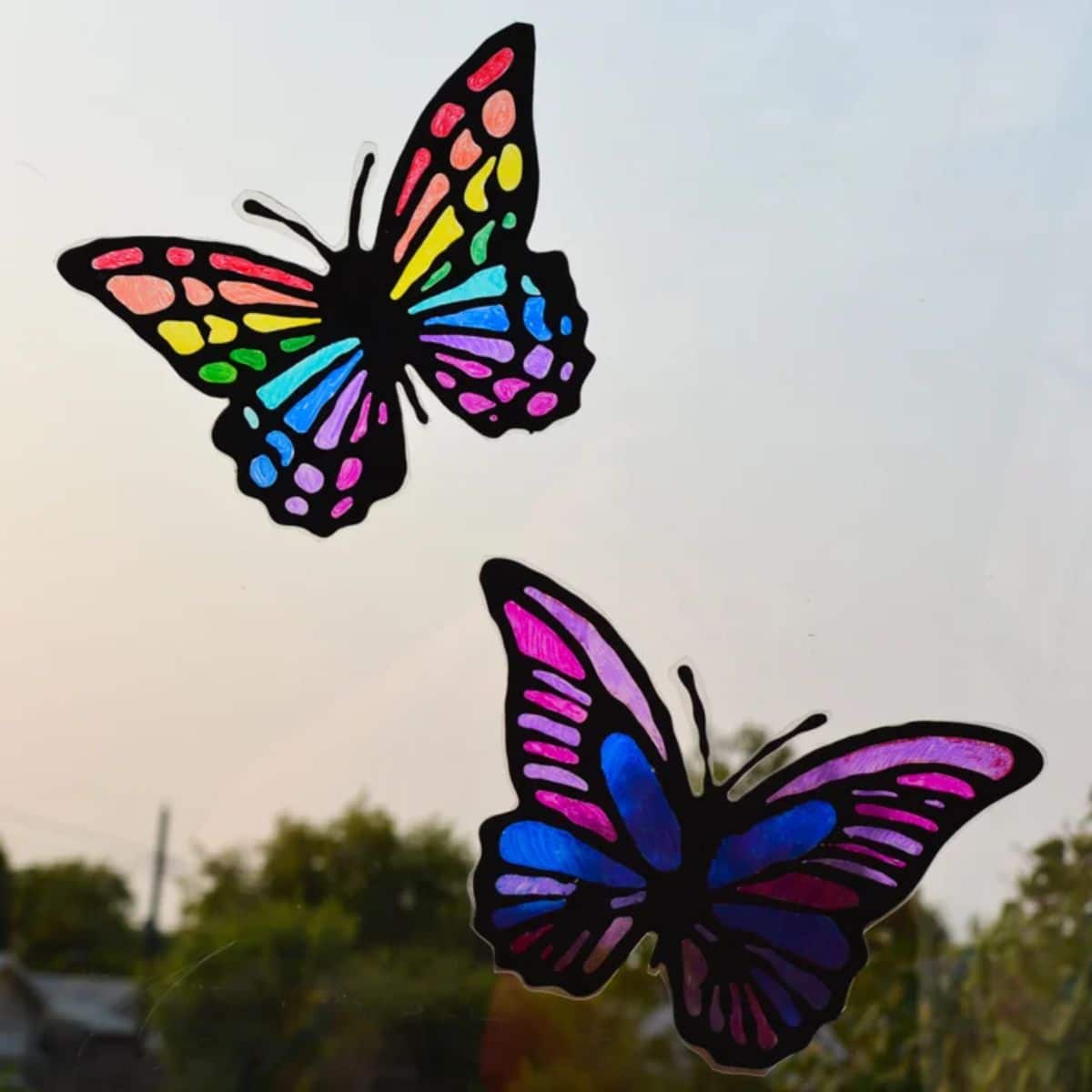 DIY Black Glue and Sharpies Butterfly Suncatcher