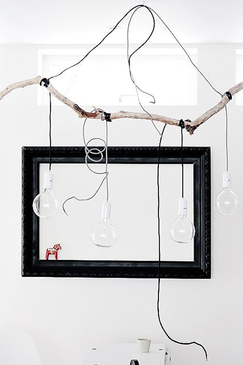 simple tree branch into a unique and stylish pendant light