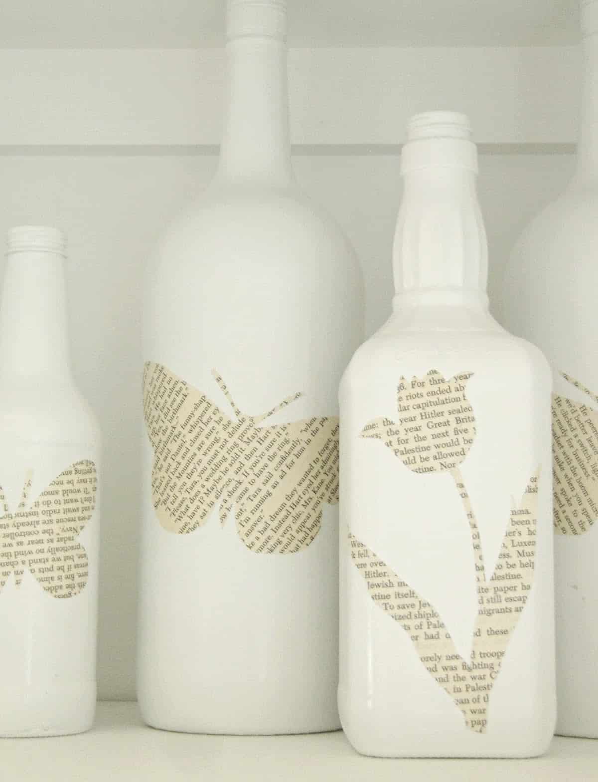wine bottles with book pages