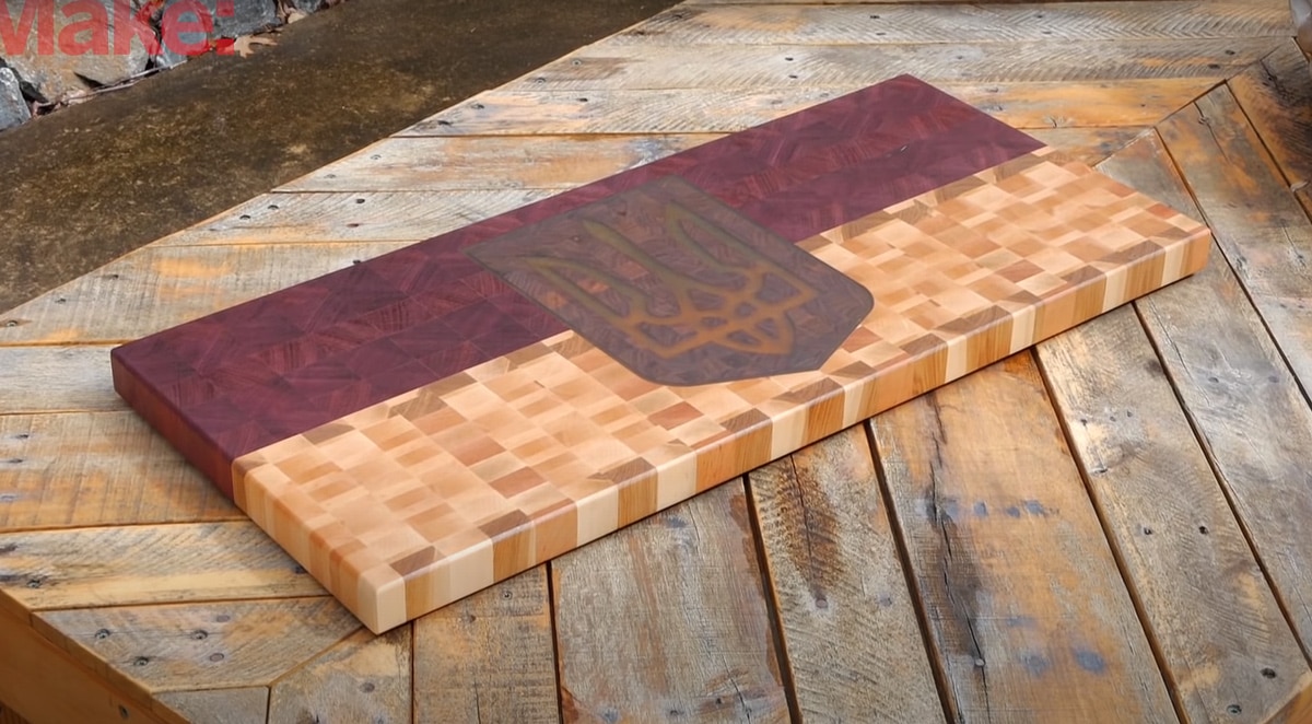 stunning end-grain cutting board with CNC inlay