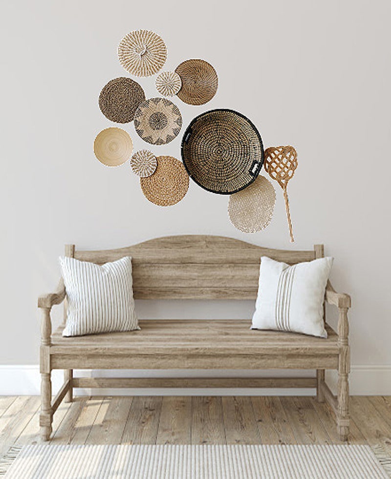 basket wall decor on wooden table and chairs