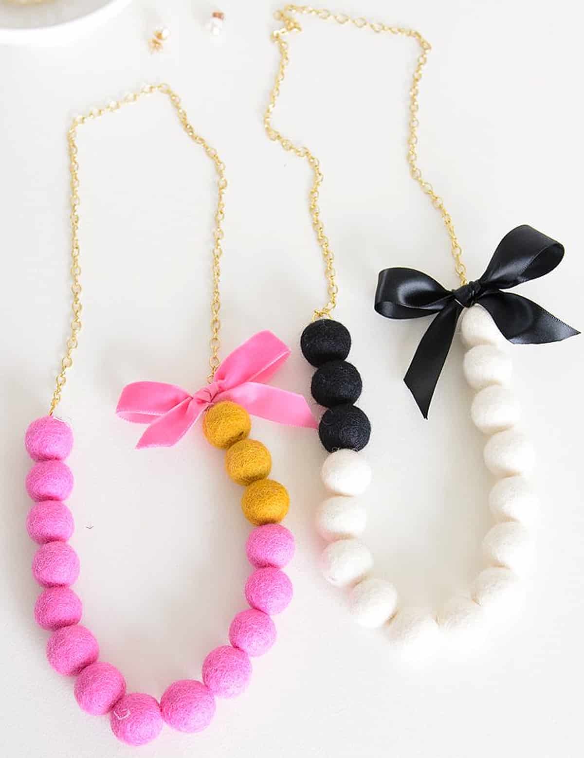 two felt ball necklaces