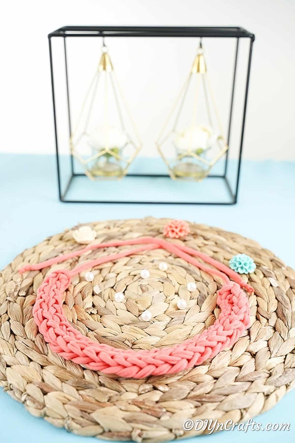 knitted necklace on table