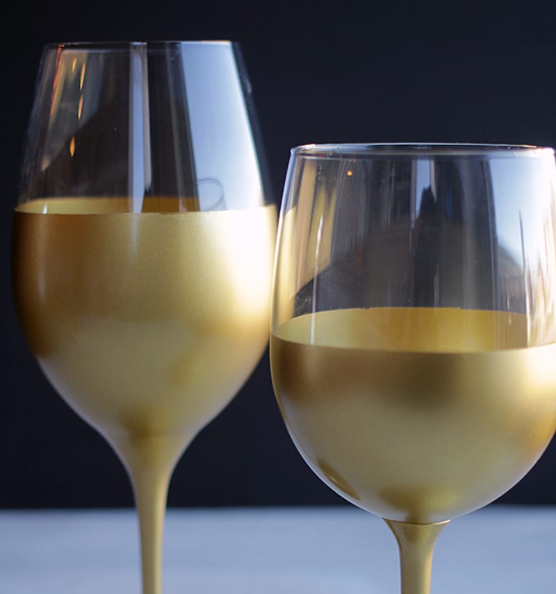 gold-dipped wine glasses
