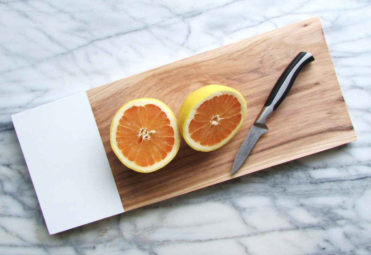 handmade hickory chop board cut oranges