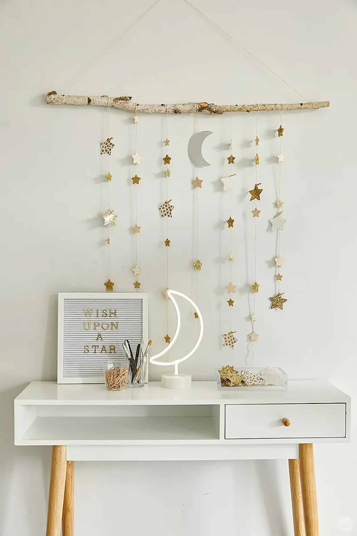 star wall hanging above table