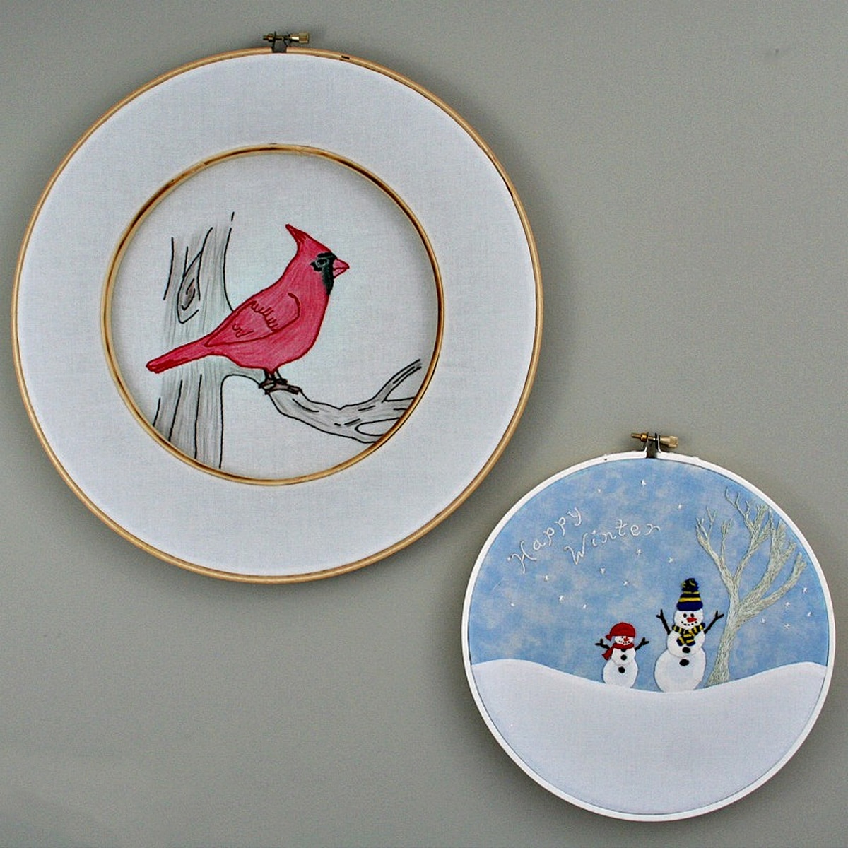 embroidered snowman and bird painting